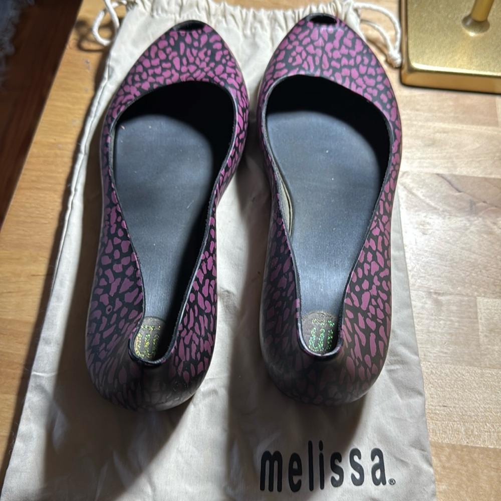 Melissa peep toe animal print flat.